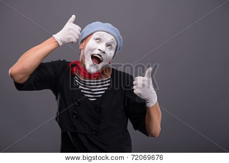 Portrait of male mime white funny face and emotions isolated on