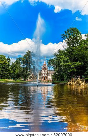 Castle Park Phillipsruhe with lake in Hanau, Germany