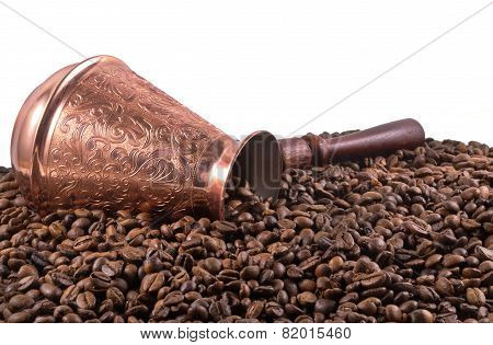 Old coffee pot and beans