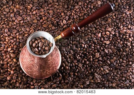 Old coffee pot and beans
