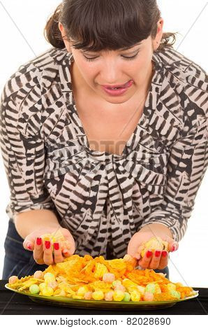 young girl overeating junk food
