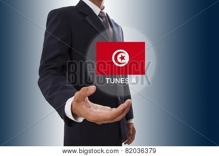 Businessman hand showing Tunesia Flag