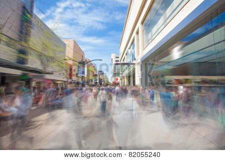 People walking along a shopping street in Adelaide, South Australia