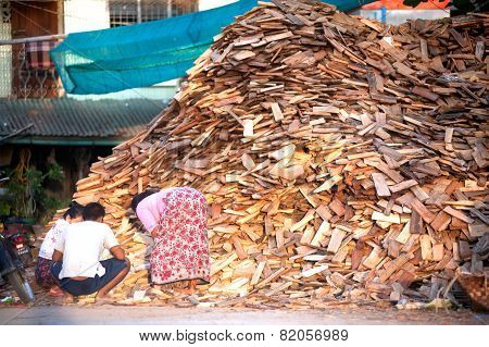 Burmese Woman Working.