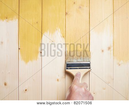Process of painting wooden boards