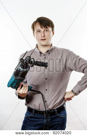 Young Man With Electric Drilling Machine Isolated On White