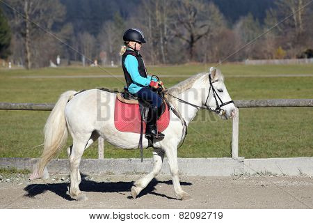 Young Girl Is Riding