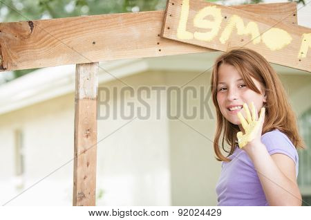 Young Girl Paintng Lemonade Stand