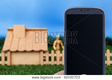 Smatrphone and house. Idea for smartphone home security system, monitoring system, real state applications, contractor, architecture, house improvements,  and others.