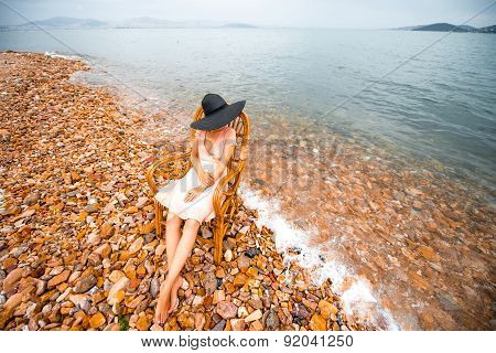 Woman resting on the beach