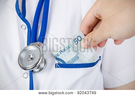 Patient Bribing Doctor, Puts Money Into The Pockets