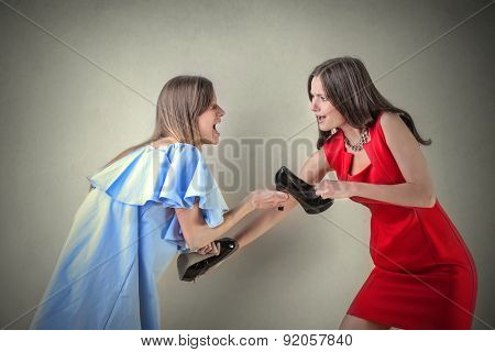 Girls fighting for a pair of shoes