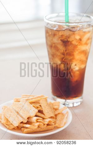 Snack On White Plate With A Glass Of Cola