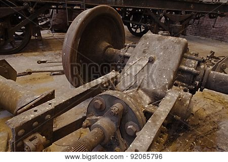Abandoned building with the remains of old train cars