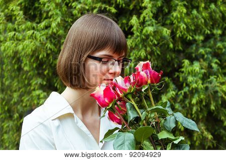 Young Wooman With Roses