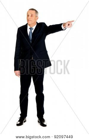 Full length boss dismissing someone.