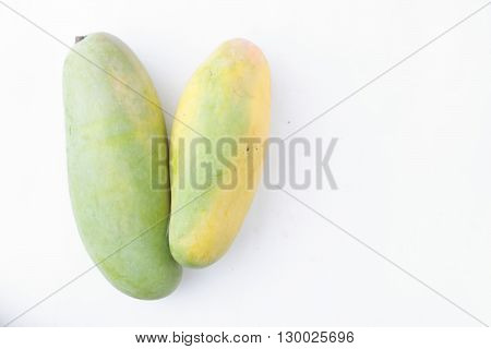 Fresh organic mango on isolated white background