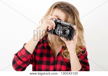 Young Woman Holding Old Retro Camera