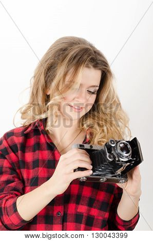 Young Woman Holding Old Retro Camera
