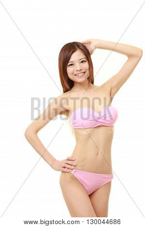 Japanese woman posing in a pink bikini