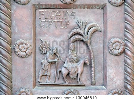 PISA, ITALY - JUNE 06, 2015: Flight to Egypt on the San Ranieri gate of the Cathedral St. Mary of the Assumption in Pisa, Italy on June 06, 2015