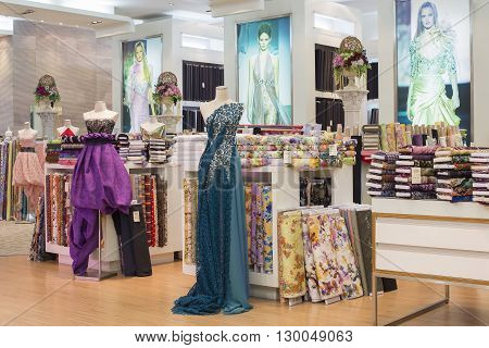 BANGKOK THAILAND - NOVEMBER 19 2013 : Women's clothing section in supermarket Siam Paragon. Siam Paragon is a one of the biggest shopping centres in Asia.
