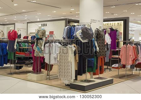 BANGKOKTHAILAND - NOVEMBER 19 2013 : Women's clothing section in supermarket Siam Paragon. Siam Paragon is a one of the biggest shopping centres in Asia.