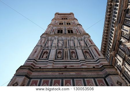 FLORENCE, ITALY - JUNE 05: Bell tower of the Cattedrale di Santa Maria del Fiore (Cathedral of Saint Mary of the Flower) is the main church of Florence, Italy on June 05, 2015