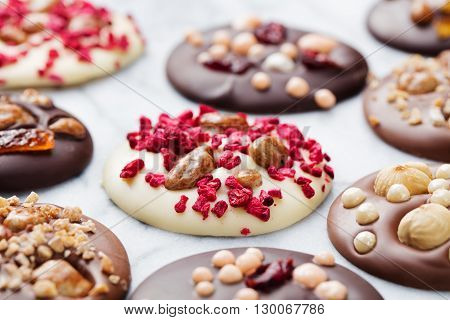 Luxury handmade chocolate mediants, cookies, bites. Traditional french Christmas dessert Copy space
