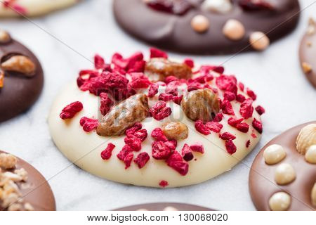 Luxury handmade chocolate mediants, cookies, bites. Traditional french Christmas dessert Copy space