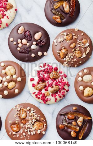 Luxury handmade chocolate mediants, cookies, bites, candies. Traditional french Christmas dessert Copy space Top view