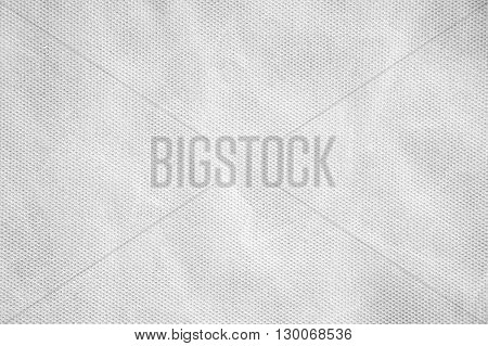 Closeup surface detail of abstract old crumpled white fabric texture background