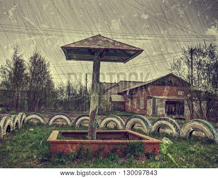Children's sandpit in the Playground in the old city. Photos in a grunge style.