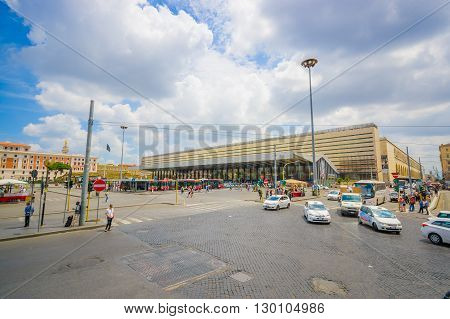 ROME, ITALY - JUNE 13, 2015: Modern bus station at Rome, people walking around and carry their lugagge, nice architecture