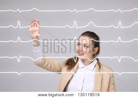 Doctor woman working with cardiogram lines