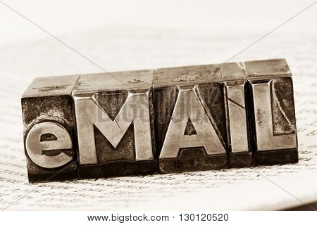written email in lead letters