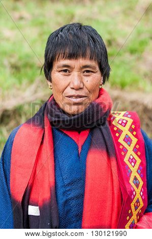 Female Senior In Traditional Clothes In Bhutan