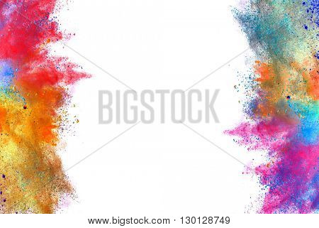 Explosion of colored powder on white background
