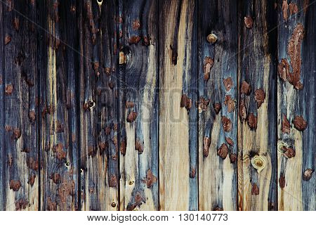Vintage dark wooden background. Beige and dark blue old board. Wood background. Wood texture.