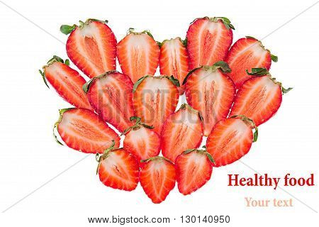 Сomposition of heart-shaped of strawberry slices. Isolated. Strawberry pattern. Food background. Valentine's Day. Macro. Texture.