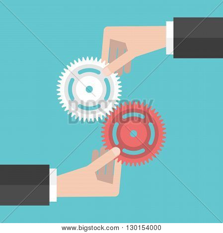 Two Hands Holding Gears