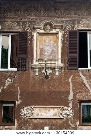 Rome. Italy. View Of The Madonna Del Latte Fresco That Adorns A Building Wall In The Piazza Del Bisc