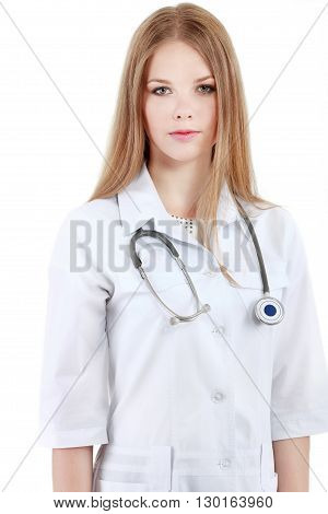 Portrait Of Young Woman Doctor With White Coat Standing In Hospital