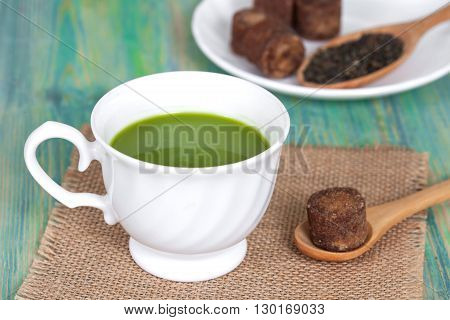 green tea with milk or hot matcha latte with cane sugar