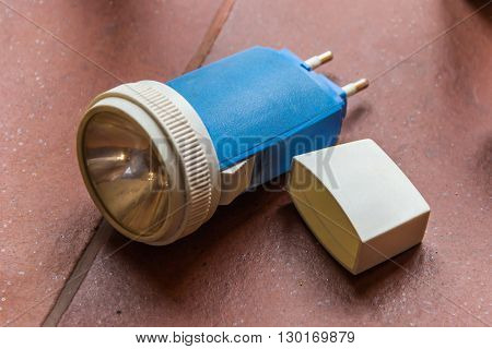 A photo with Famouse in USSR rechargeable flashlight
