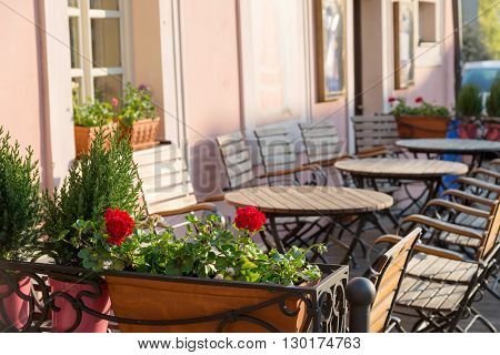 cozy outdoor cafe in early spring morning