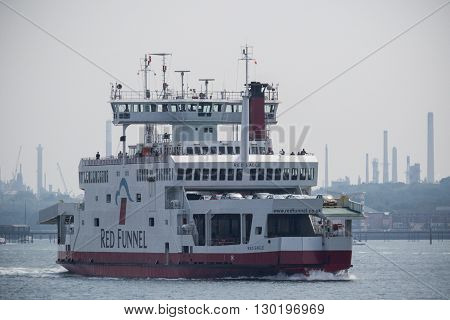 Southampton UK - 14th May 2016. The Red Funnel Ferry Red Eagle heading from the Isle of Wight sailing in Southampton Water. The Red Funnel Serves the Southampton to East Cowes route.