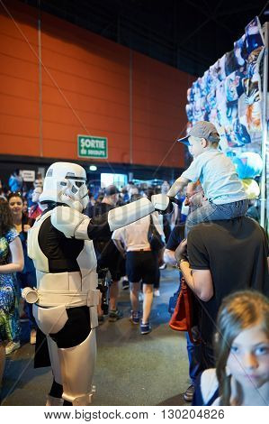 Strasbourg France - May 8 2016: Darth Vader Shaking Hand With Little Fan Boy At The Open Market Digi