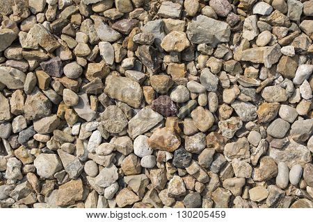 Stones on the road in a sunlight