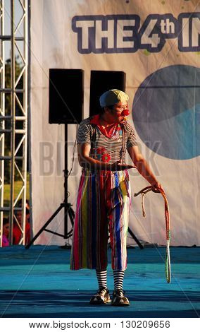 ANKARA/TURKEY-JULY 2, 2011: Harlequin at the stage of AKM Cultural Center during the Ankara Shopping Festival. July 2, 2011-Ankara/Turkey